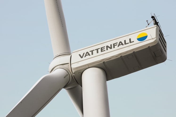 Wind turbine close up against a blue sky. Wind turbine close up against a blue sky.